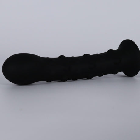 Zwarte geribbelde siliconen dildo